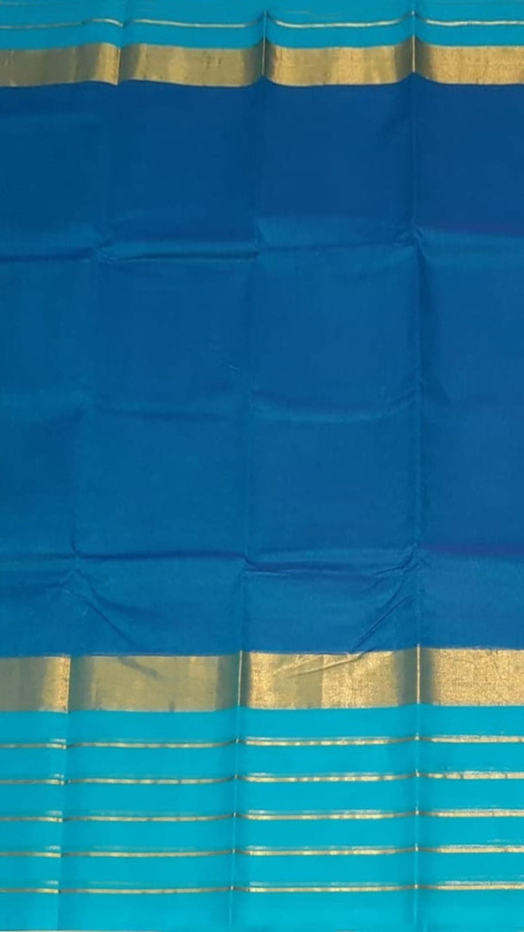 Bright Blue Cotton Saree with Light Blue and Golden Border
