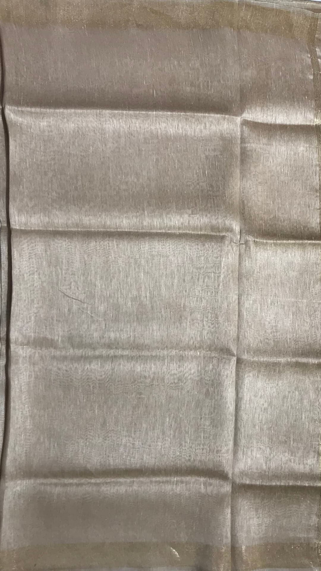 Cream silk linen saree with cutwork pallu